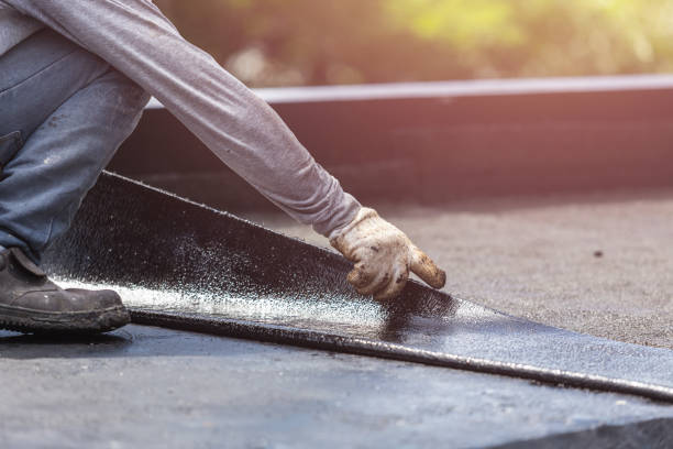 Professional Waterproofing technician working in Kingston, WI